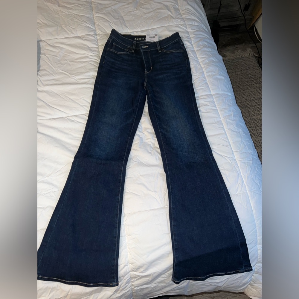 American Eagle,next level, stretch, super high-rise flare. Size 4.Dark blue